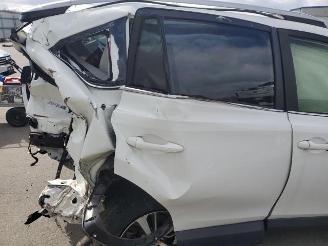 Photo 10 from auction – 2017 TOYOTA RAV4 XLE with VIN JTMRFREV8HJ130077