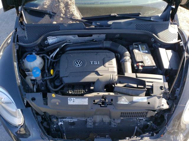 Photo 11 from auction – 2014 VOLKSWAGEN BEETLE with VIN 3VWJ17AT2EM660643