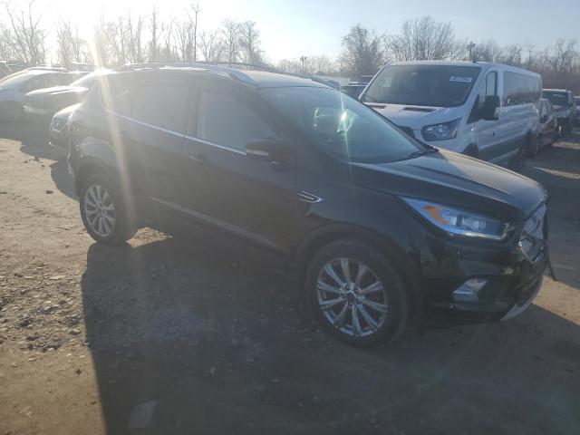 Photo 4 from auction – 2017 FORD ESCAPE TIT with VIN 1FMCU9JD7HUD86164