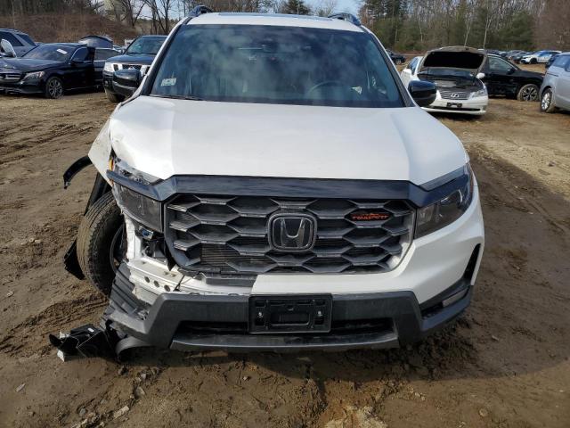 Photo 5 from auction – 2023 HONDA PASSPORT T with VIN 5FNYF8H69PB024690