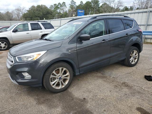 FORD ESCAPE SE 2018 with VIN 1FMCU9GD1JUD06323 - Photo from auction