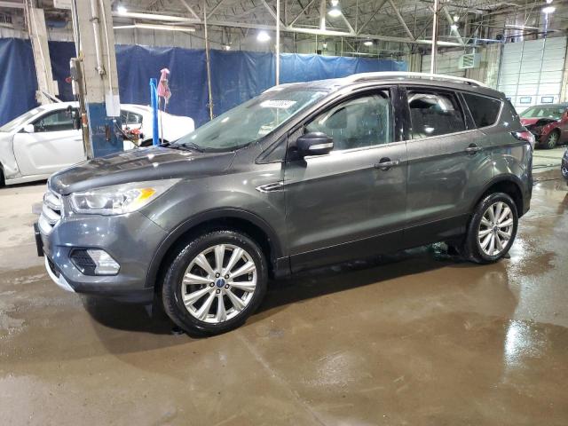 FORD ESCAPE TIT 2017 with VIN 1FMCU9JD1HUC70829 - Photo from auction