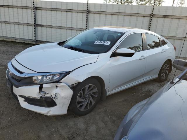 Photo 1 from auction – 2018 HONDA CIVIC EX with VIN 19XFC2F74JE038843
