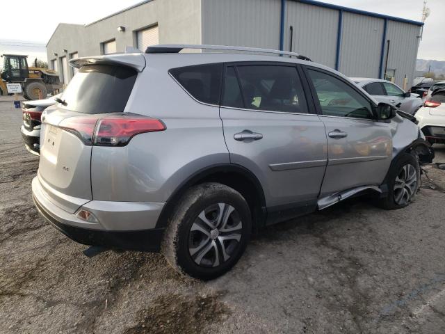 Photo 3 from auction – 2018 TOYOTA RAV4 LE with VIN JTMZFREV3JJ181377