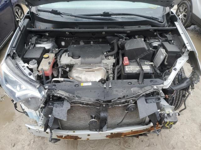 Photo 11 from auction – 2018 TOYOTA RAV4 LE with VIN 2T3BFREV0JW788159