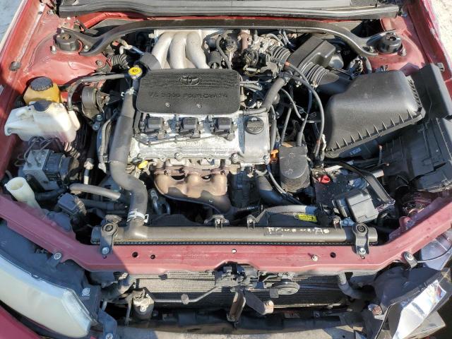 Photo 11 from auction – 2002 TOYOTA CAMRY SOLA with VIN 2T1CF22PX2C556259