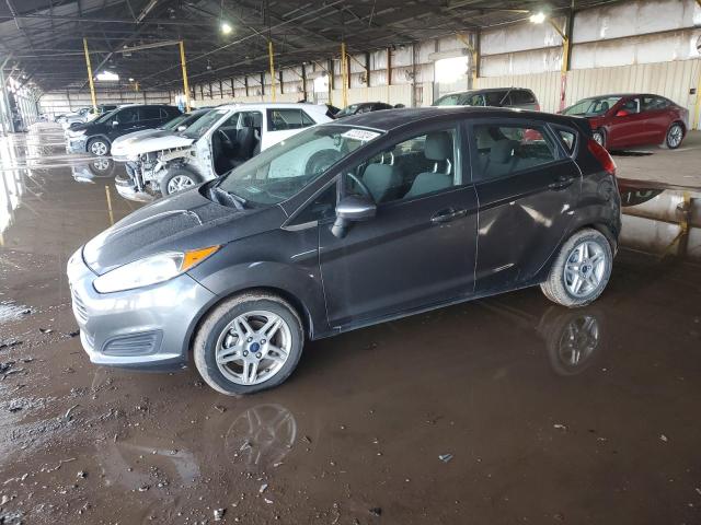 FORD FIESTA SE 2018 with VIN 3FADP4EJ7JM106598 - Photo from auction