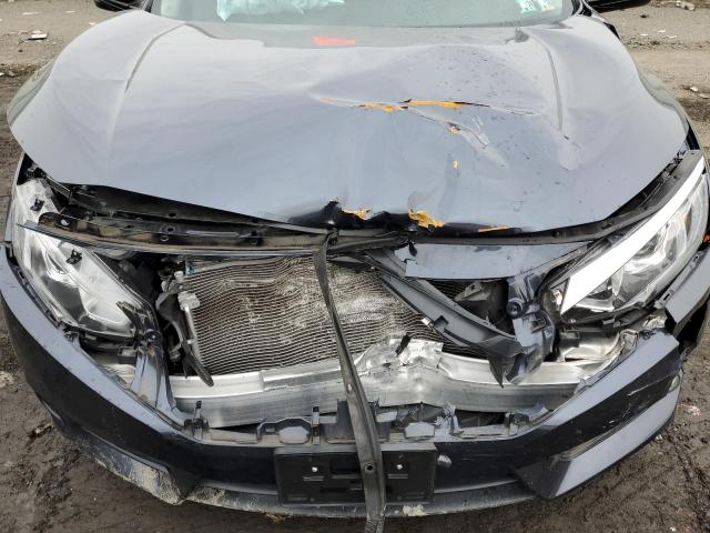 Photo 11 from auction – 2018 HONDA CIVIC EX with VIN JHMFC1F34JX043417