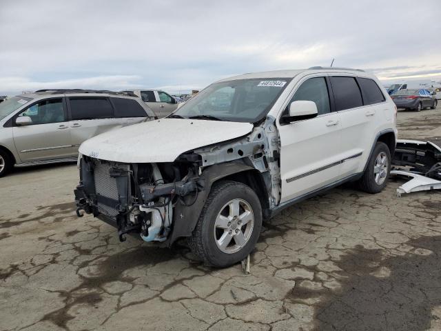 JEEP GRAND CHER 2011 with VIN 1J4RR4GG5BC574354 - Photo from auction