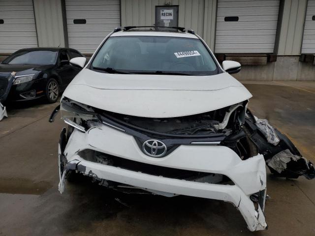 Photo 5 from auction – 2016 TOYOTA RAV4 XLE with VIN JTMRFREV9GJ057011