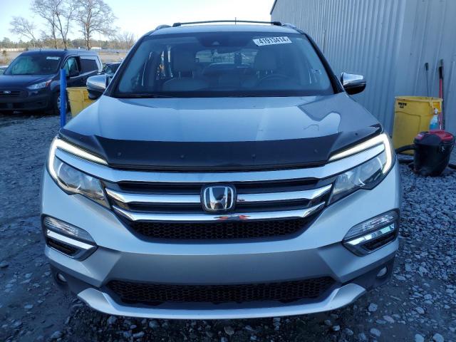 Photo 5 from auction – 2018 HONDA PILOT TOUR with VIN 5FNYF5H91JB014218