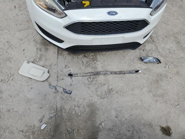 Photo 12 from auction – 2017 FORD FOCUS SE with VIN 1FADP3F24HL256665