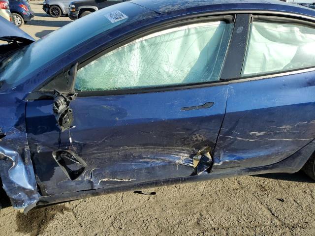 Photo 7 from auction – 2022 TESLA MODEL 3 with VIN 5YJ3E1EA4NF123007