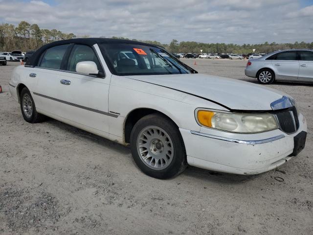 Photo 4 from auction – 2002 LINCOLN TOWN CAR C with VIN 1LNHM83W82Y603820