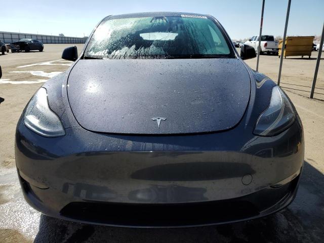 Photo 5 from auction – 2023 TESLA MODEL Y with VIN 7SAYGDEF2PF777779