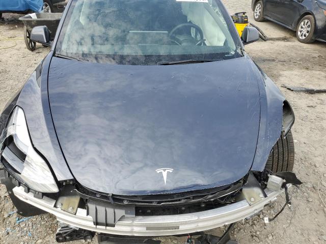 Photo 11 from auction – 2023 TESLA MODEL 3 with VIN 5YJ3E1EAXPF705745
