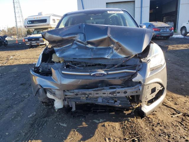 Foto 5 de la subasta – 2016 FORD ESCAPE SE con VIN 1FMCU0G76GUA48394