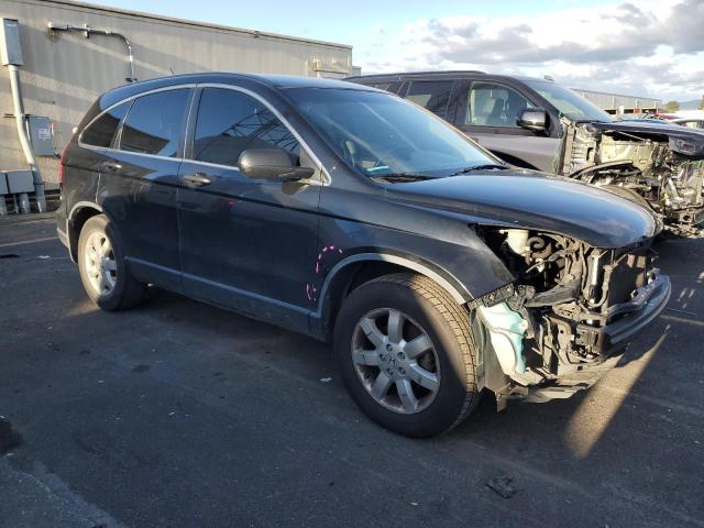 Photo 4 from auction – 2011 HONDA CR-V SE with VIN JHLRE3H4XBC009701