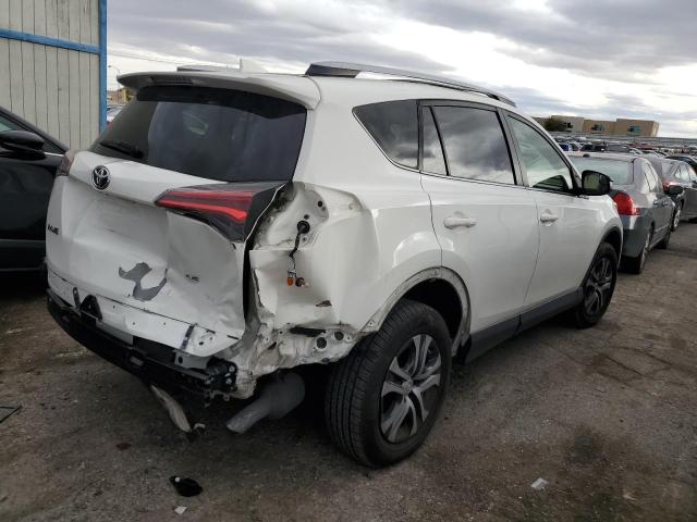 Photo 3 from auction – 2017 TOYOTA RAV4 LE with VIN JTMZFREV0HJ104427