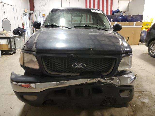 Photo 5 from auction – 2001 FORD F150 SUPER with VIN 1FTRW08L01KF60059