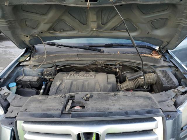 Photo 11 from auction – 2006 HONDA PILOT LX with VIN 5FNYF28156B027084