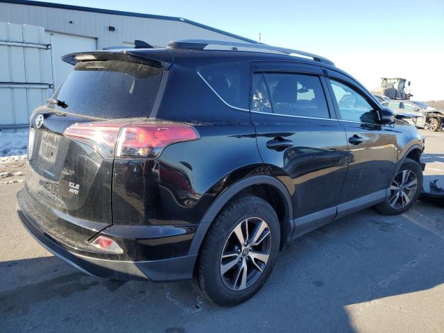 Photo 3 from auction – 2017 TOYOTA RAV4 XLE with VIN 2T3RFREV1HW570658