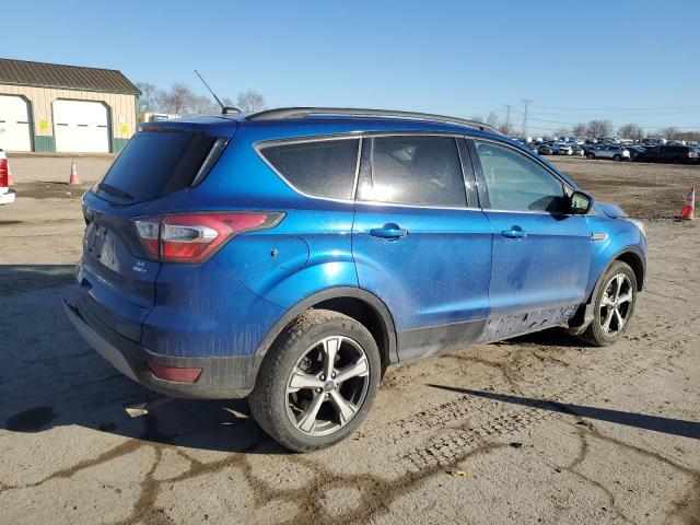 Photo 3 from auction – 2017 FORD ESCAPE SE with VIN 1FMCU9GD4HUB38087