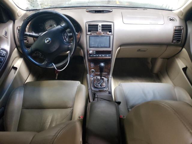 Photo 8 from auction – 2002 NISSAN MAXIMA GLE with VIN JN1DA31A72T001383