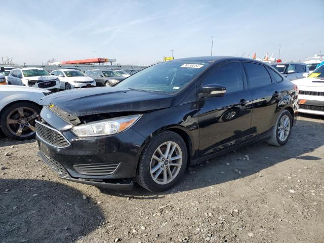 FORD FOCUS SE 2017 with VIN 1FADP3F23HL340802 - Photo from auction