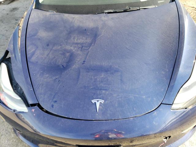 Photo 11 from auction – 2022 TESLA MODEL 3 with VIN 5YJ3E1EB4NF167081