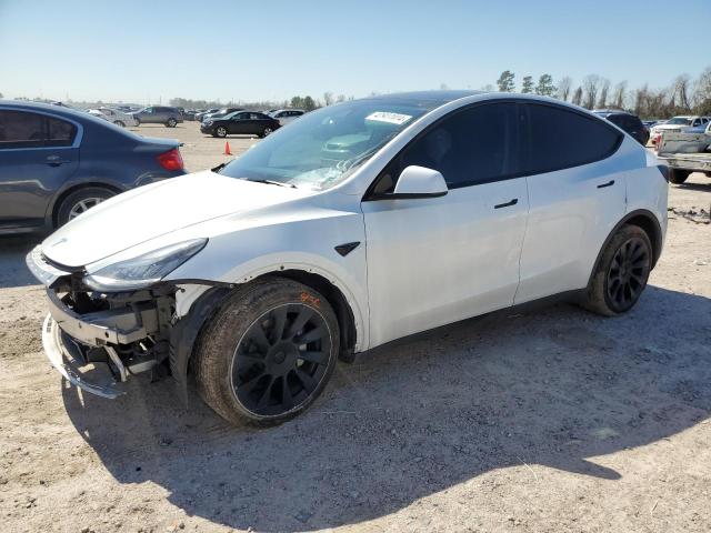 TESLA MODEL Y 2022 with VIN 7SAYGDEE5NA011384 - Photo from auction