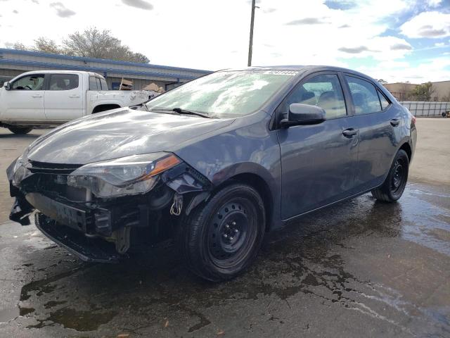 TOYOTA COROLLA LE 2018 with VIN 5YFBURHE3JP818637 - Photo from auction