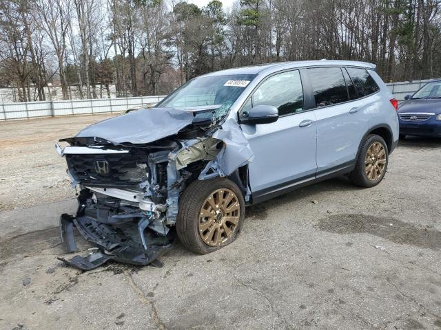 HONDA PASSPORT E 2023 with VIN 5FNYF8H51PB023282 - Photo from auction