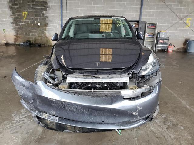 Photo 5 from auction – 2020 TESLA MODEL Y with VIN 5YJYGDEE4LF007081