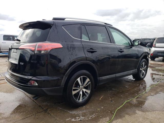 Photo 3 from auction – 2016 TOYOTA RAV4 XLE with VIN 2T3WFREV4GW298088