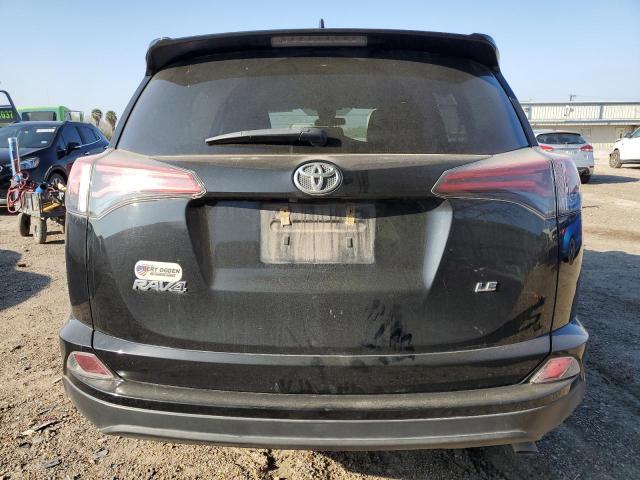 Photo 6 from auction – 2018 TOYOTA RAV4 LE with VIN 2T3ZFREV8JW484298