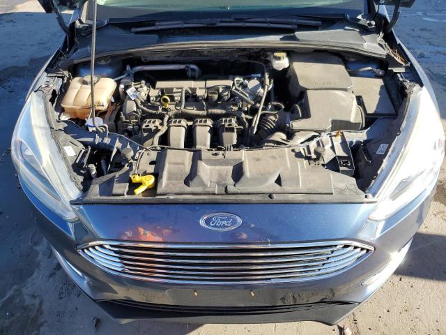 Photo 11 from auction – 2018 FORD FOCUS TITA with VIN 1FADP3N24JL314586