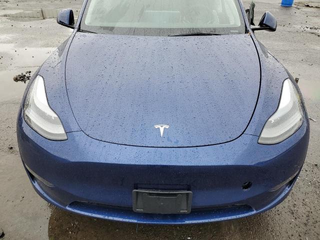 Photo 12 from auction – 2023 TESLA MODEL Y with VIN 7SAYGDEE9PF849634