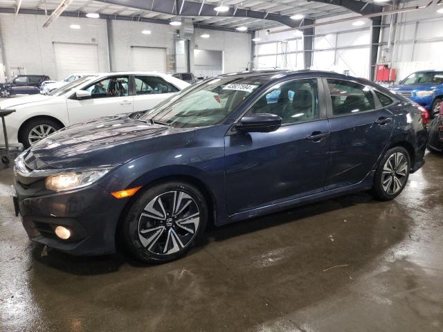 HONDA CIVIC EX 2017 with VIN 19XFC1F31HE031429 - Photo from auction