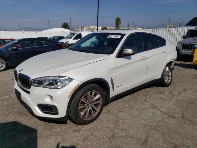 BMW X6 2019 with VIN 5UXKU0C56K0S97815 - Photo from auction