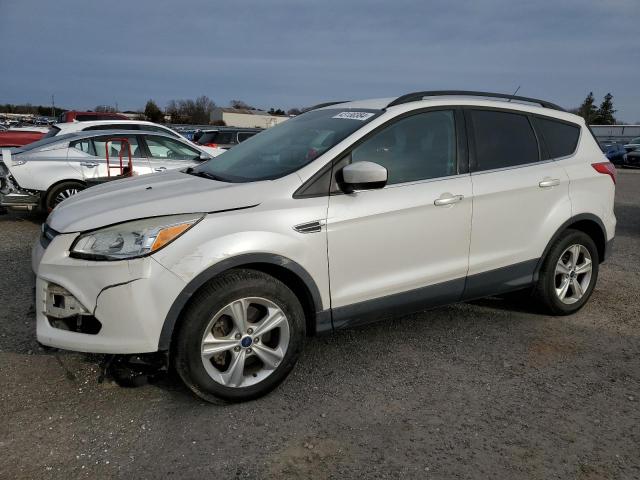 FORD ESCAPE SE 2016 with VIN 1FMCU9G90GUA06390 - Photo from auction
