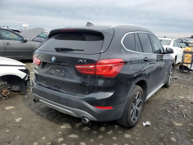 Photo 3 from auction – 2017 BMW X1 XDRIVE2 with VIN WBXHT3Z38H4A54097