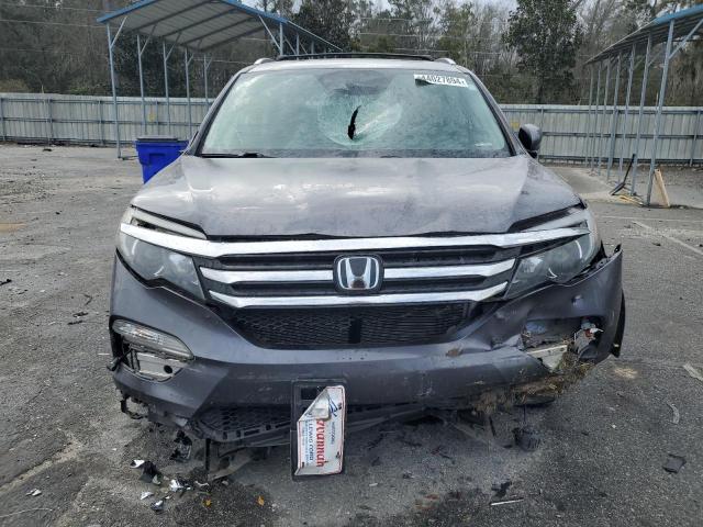 Photo 5 from auction – 2016 HONDA PILOT TOUR with VIN 5FNYF5H91GB051360