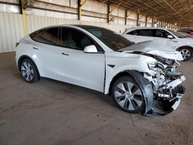 Photo 4 from auction – 2023 TESLA MODEL Y with VIN 7SAYGAEE3PF642820