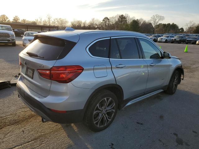 Photo 3 from auction – 2017 BMW X1 XDRIVE2 with VIN WBXHT3Z36H4A54521