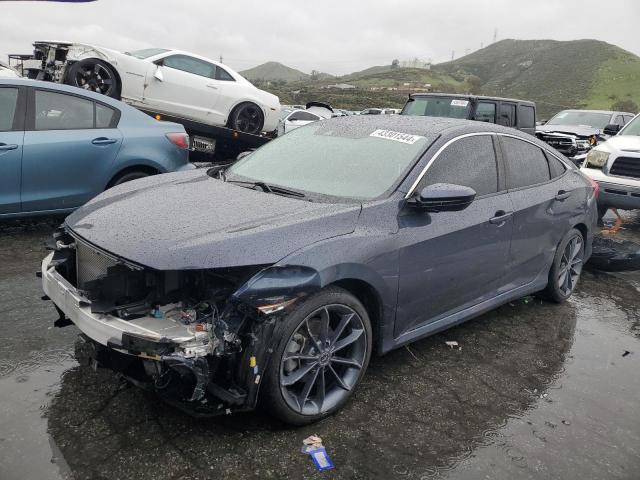Photo 1 from auction – 2019 HONDA CIVIC LX with VIN 2HGFC2F66KH548996