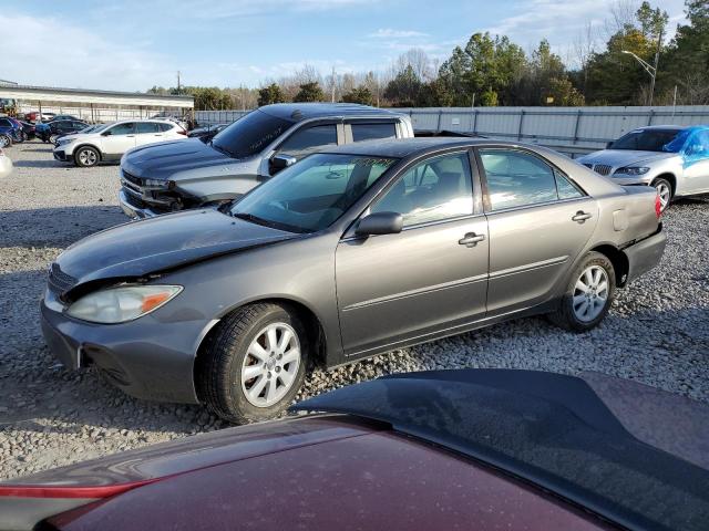 TOYOTA CAMRY LE 2002 with VIN 4T1BF32K32U530543 - Photo from auction