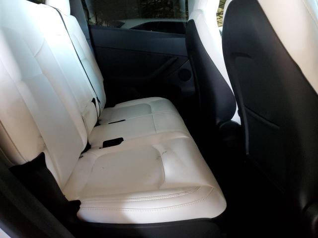 Photo 10 from auction – 2023 TESLA MODEL Y with VIN 7SAYGAEE3PF642820