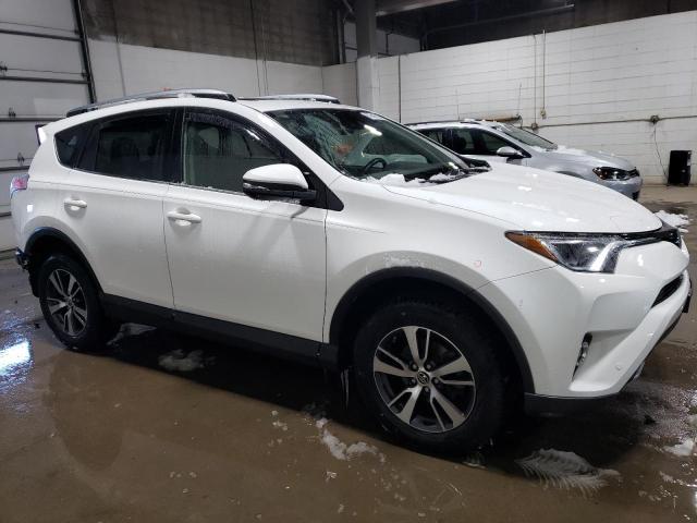 Photo 4 from auction – 2017 TOYOTA RAV4 XLE with VIN JTMRFREV8HJ117443