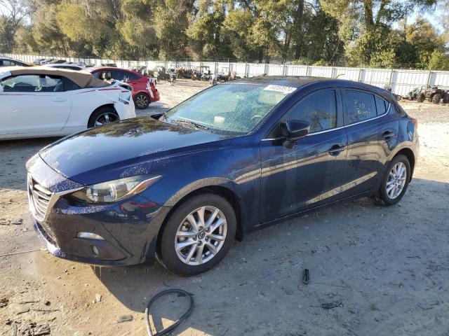 MAZDA 3 TOURING 2015 with VIN 3MZBM1L7XFM137591 - Photo from auction
